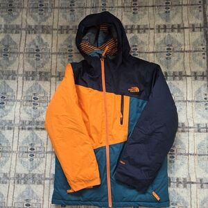 The North Face Kids Orange and Navy Puffer Jacket